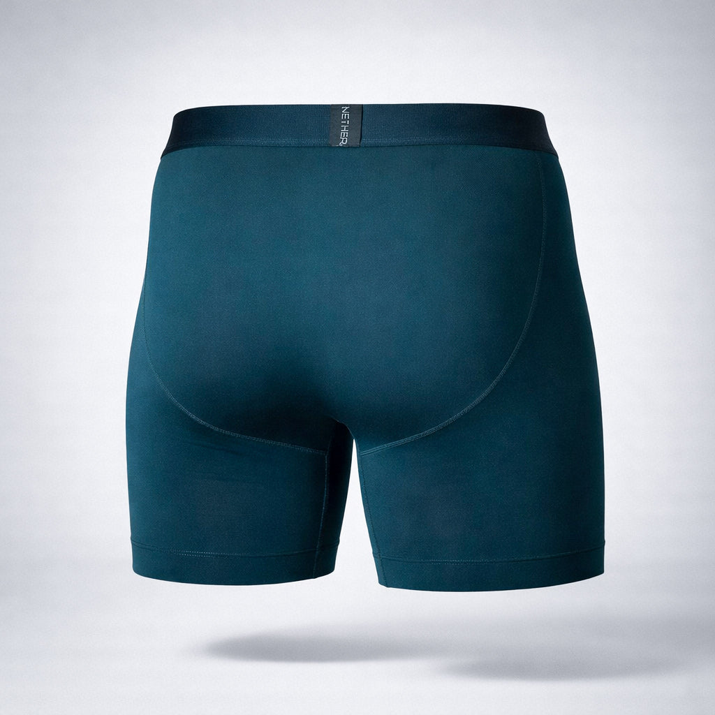 Nether Boxer Brief in Forest - back view product shot showing clean rear seam construction, contoured fit, and premium black waistband