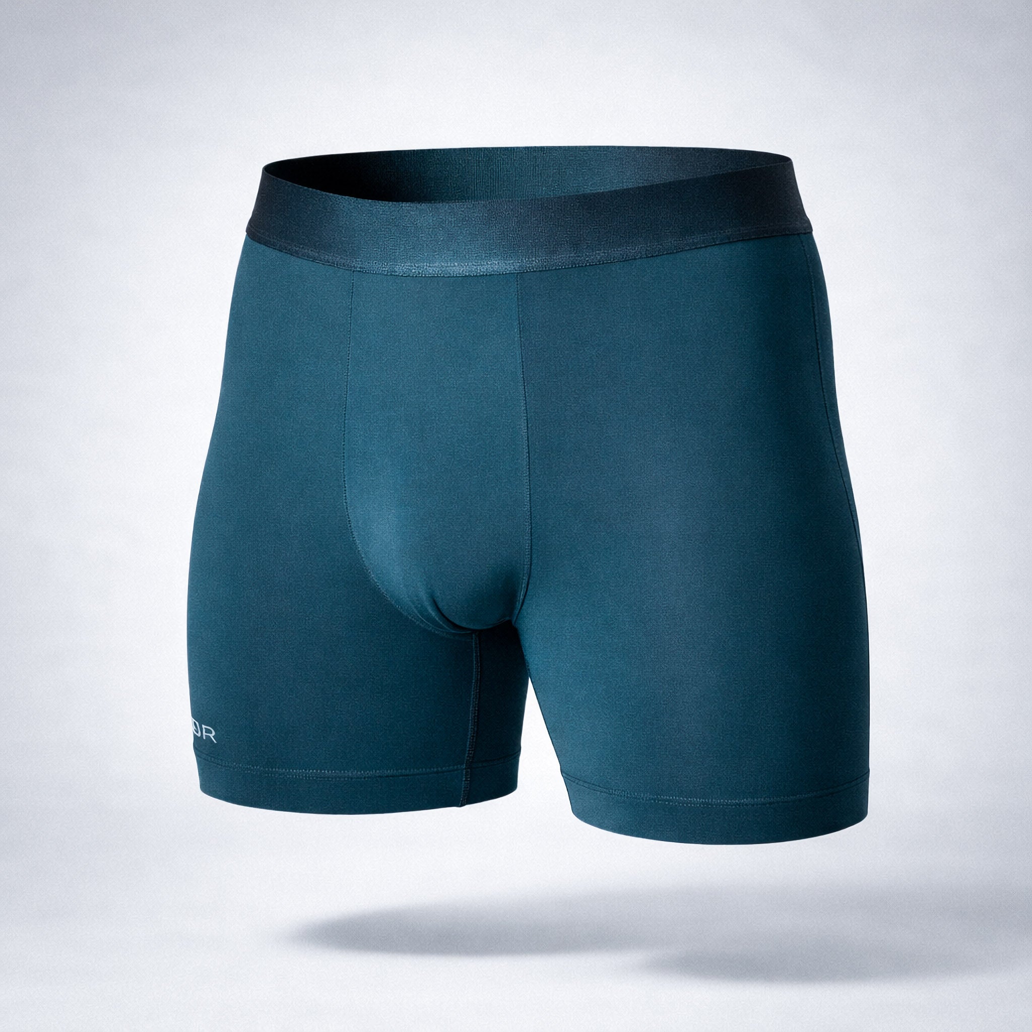 Nether Boxer Brief in Forest - angled front view showing Valley Pouch anatomical design, Trail Grip leg bands, and 6-inch inseam in TENCEL Lyocell fabric