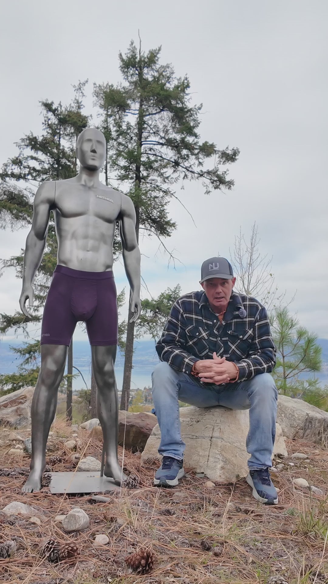Stephen's dad explains why Roam stays put, next to a mannequin wearing Roam in Storm