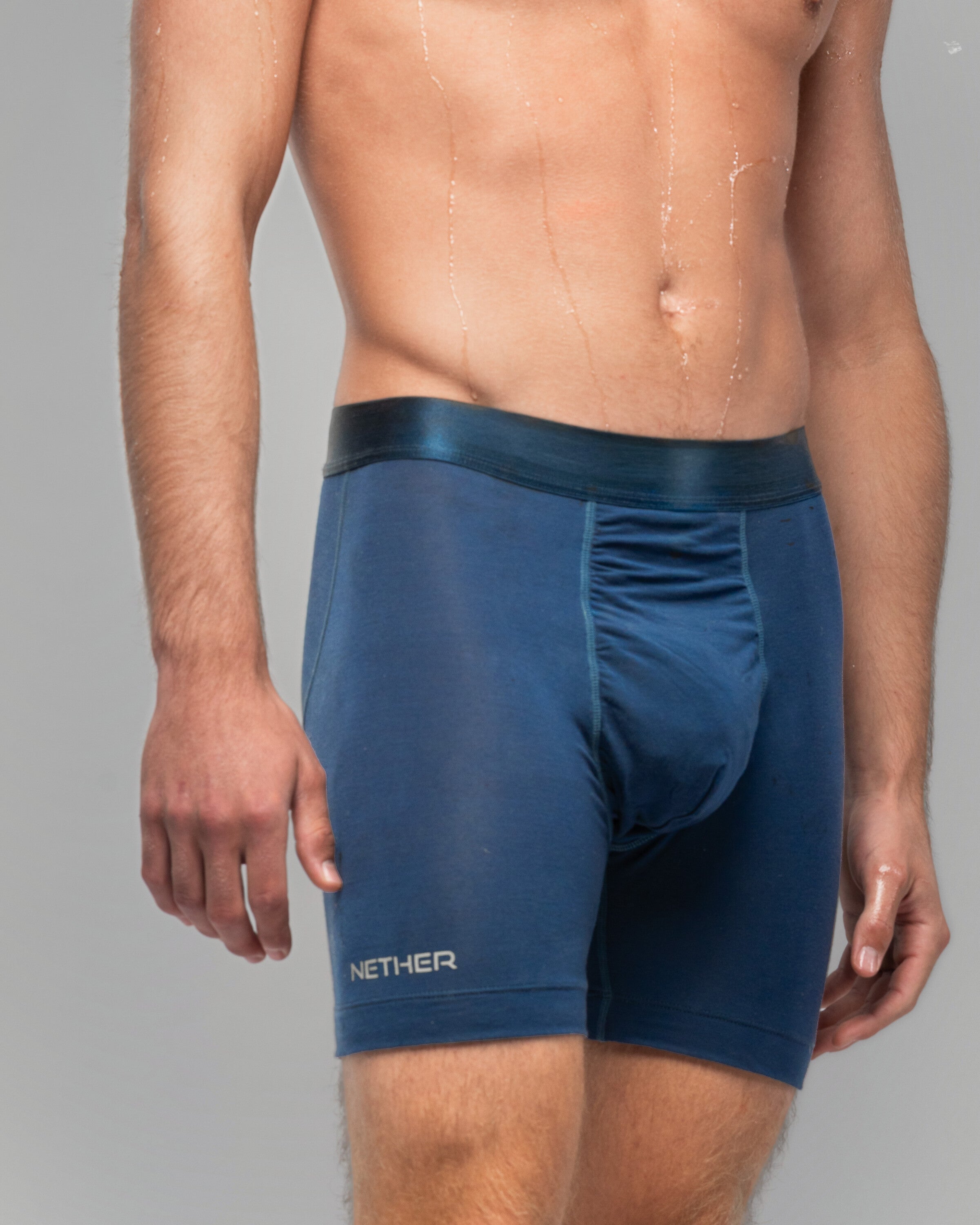 [Archive] Nether Roam Boxer Brief in navy, front waist-down view showing the Valley Pouch panel