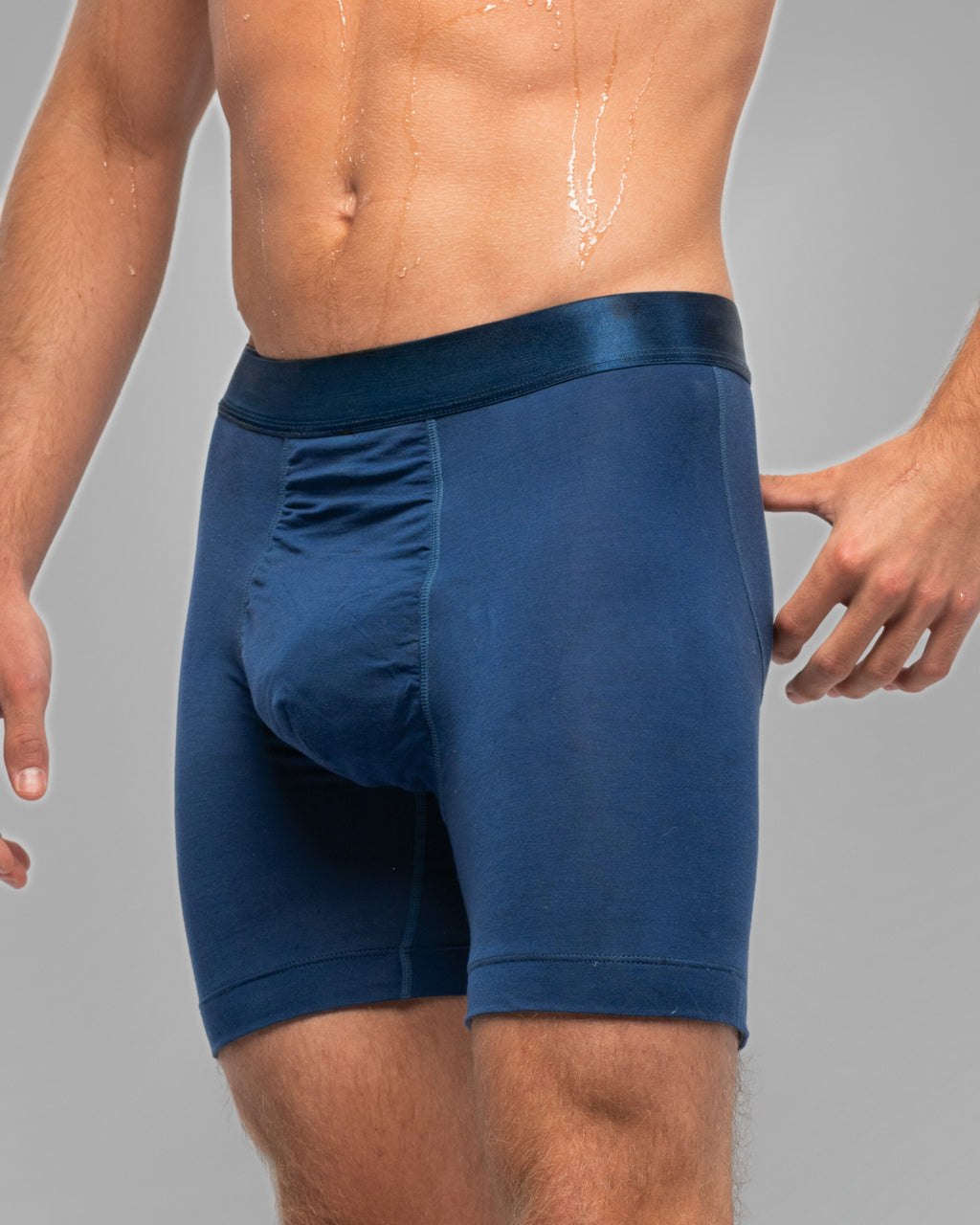 [Archive] Nether Roam Boxer Brief in navy, three-quarter waist-down view showing the pouch panel seam