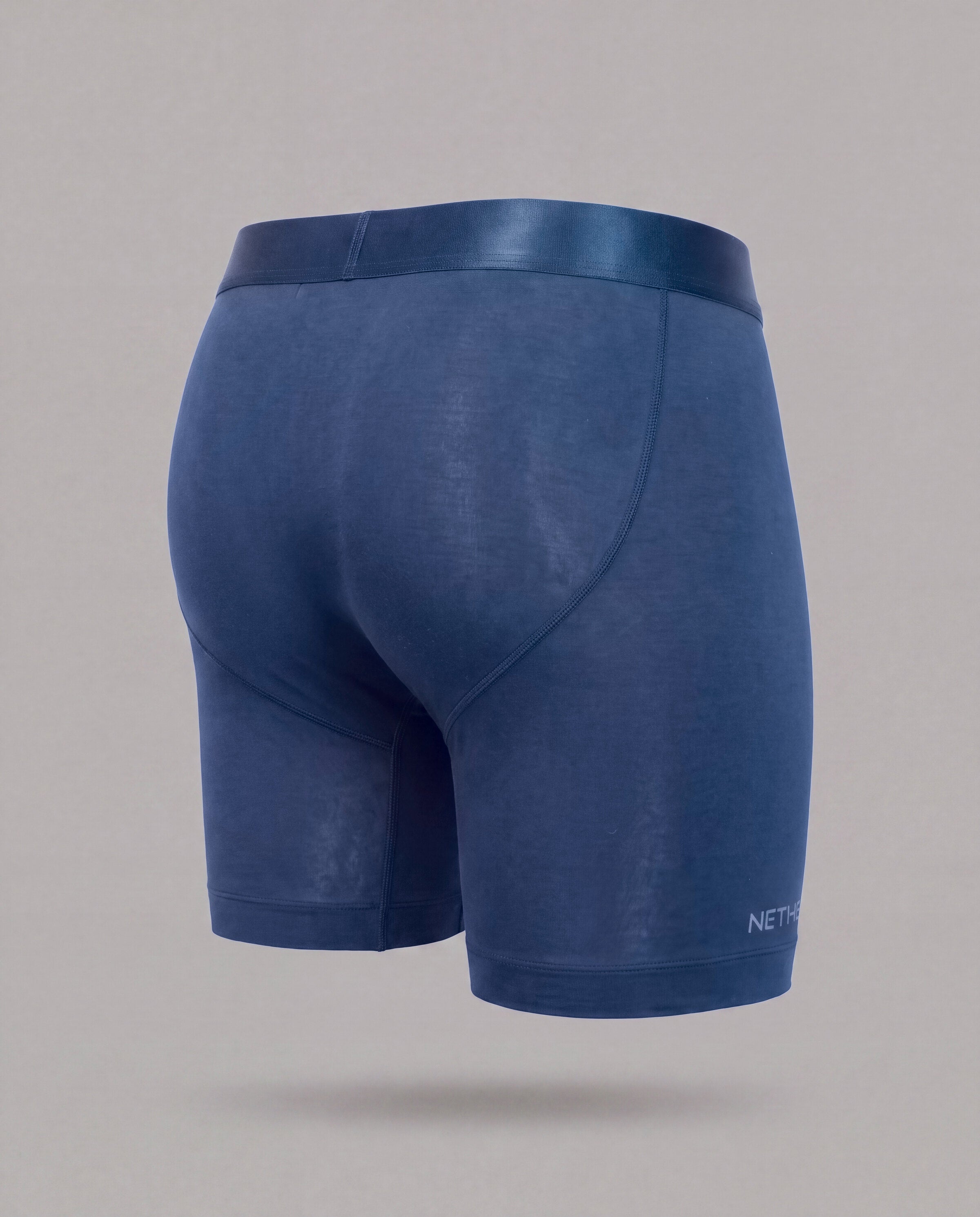 [Abyss 3] Nether Roam Boxer Brief in navy, back three-quarter view showing the contoured seat and leg length
