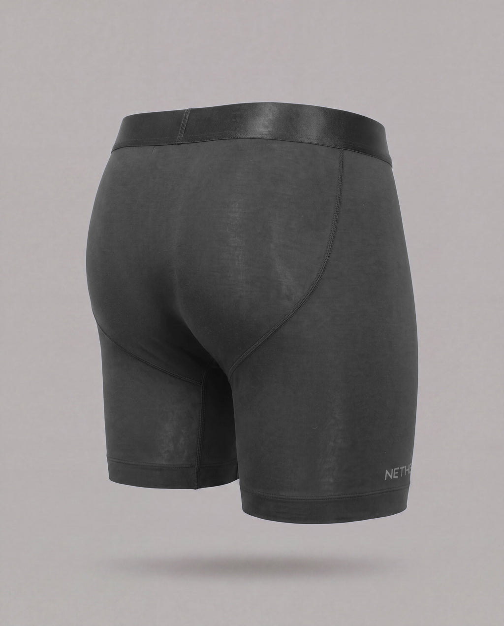 [Midnight 3] Nether Roam Boxer Brief in black, back three-quarter view showing the contoured seat and leg length
