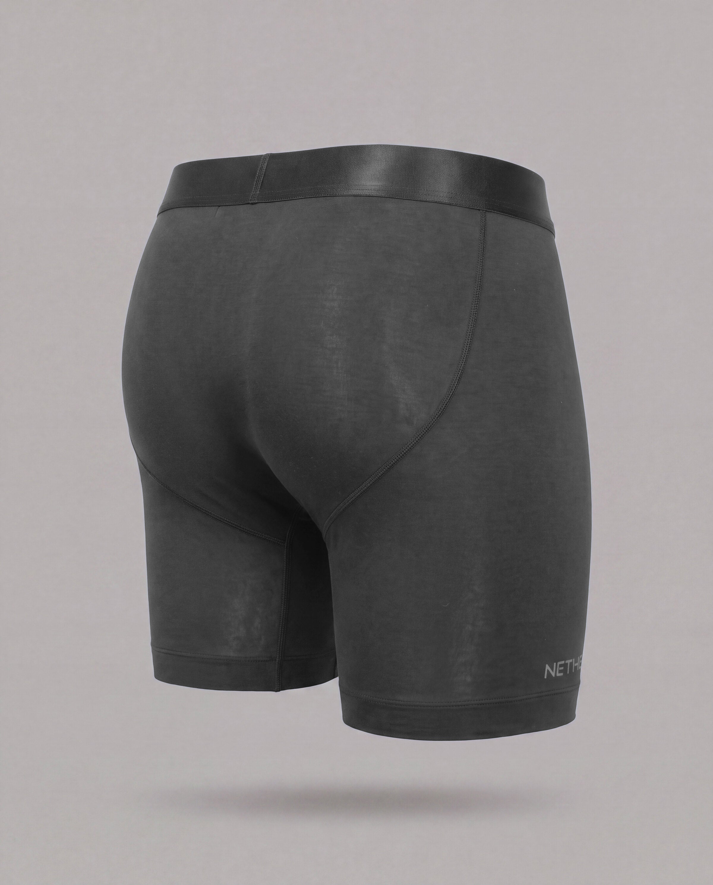 [Midnight 3] Nether Roam Boxer Brief in black, back three-quarter view showing the contoured seat and leg length