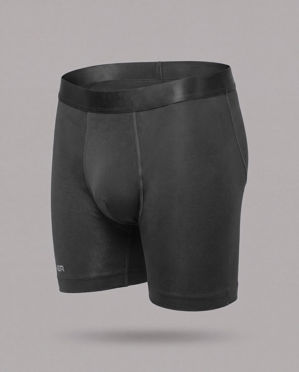 [Midnight 1] Nether Roam Boxer Brief in black, front three-quarter view showing the full cut, satin waistband and Valley Pouch