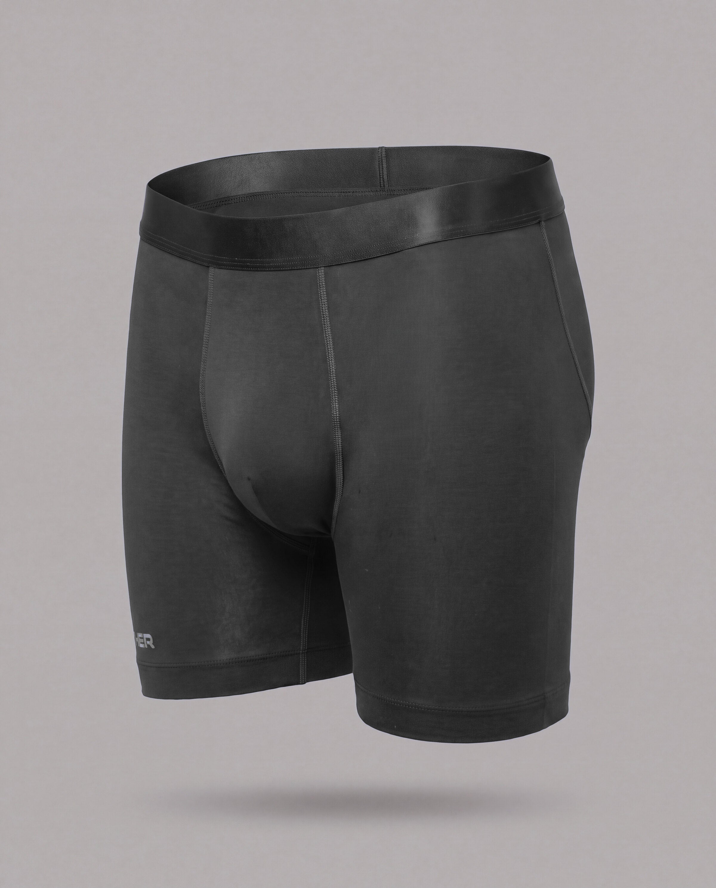 [Midnight 1] Nether Roam Boxer Brief in black, front three-quarter view showing the full cut, satin waistband and Valley Pouch
