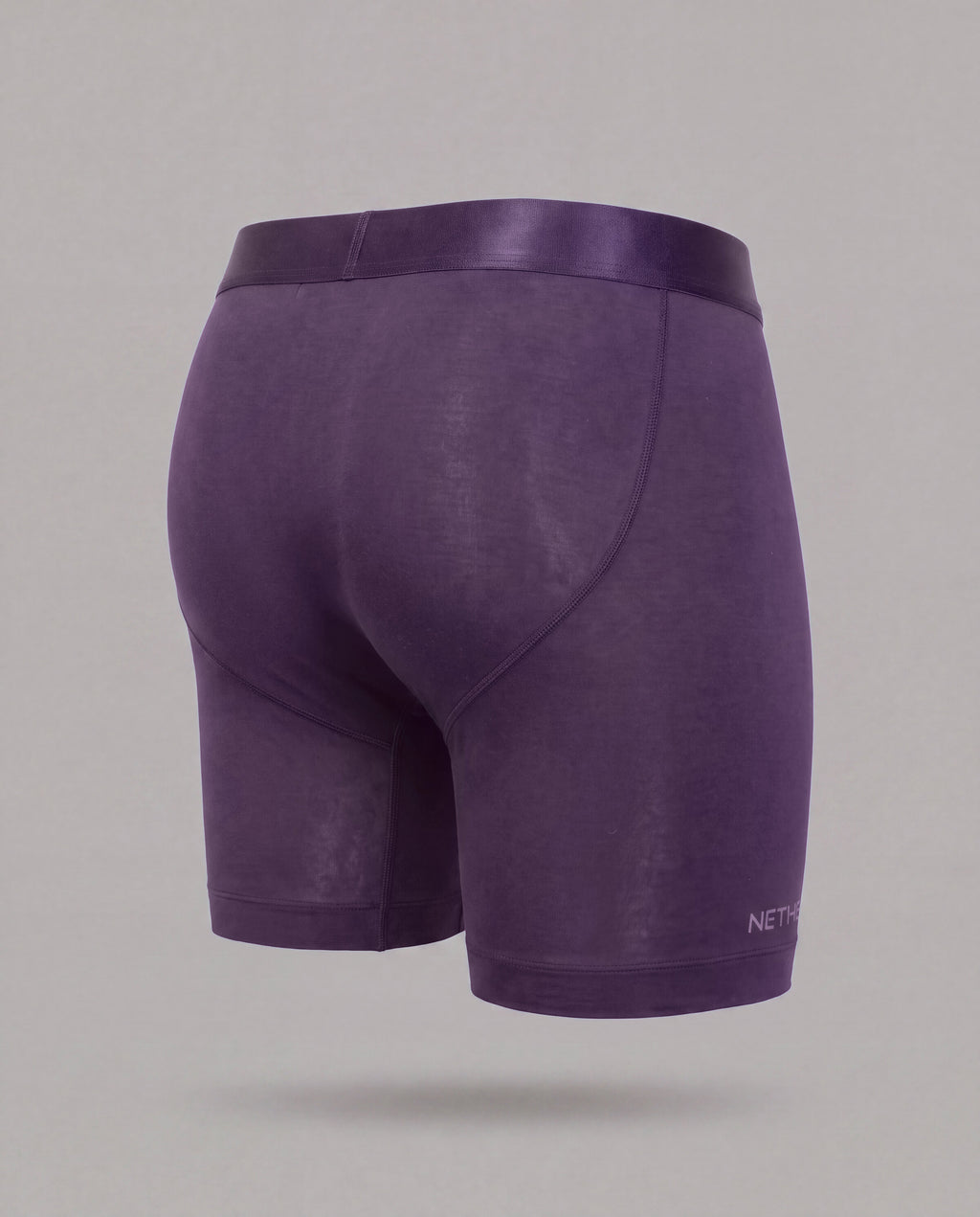 [Storm 3] Nether Roam Boxer Brief in dark purple, back three-quarter view showing the contoured seat and leg length