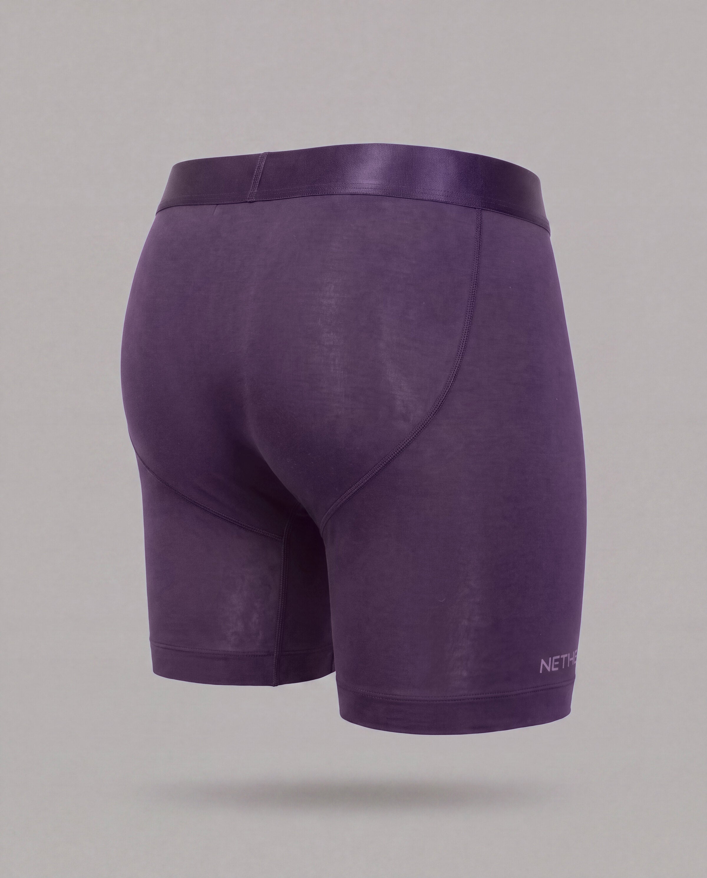 [Storm 3] Nether Roam Boxer Brief in dark purple, back three-quarter view showing the contoured seat and leg length